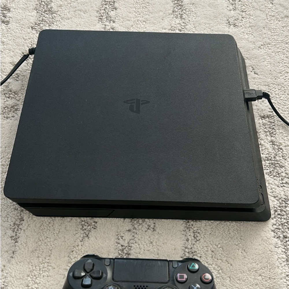 Sony PlayStation Slim Console with Black Controller